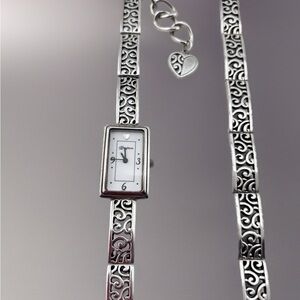 Brighton Nice silverplated watch with an adjustable toggle heart bracelet band.